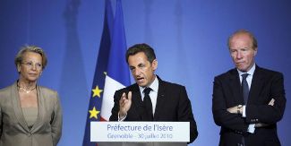 Nicolas Sarkozy,Michèle Alliot-Marie et Brice Hortefeux, en déplacement à Grenoble, le 30 juillet à Grenoble.