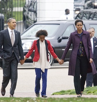 Barack et Michelle Obama avec leur fille Sasha le 18 mars 2012