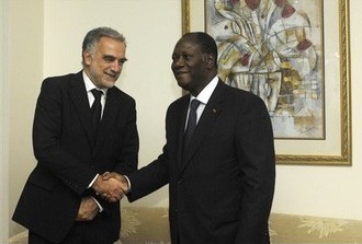 Luis Moreno Ocampo et Alassane Ouattara le samedi 15 octobre