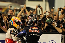 Lewis Hamilton congratulant Sebastien Vettel le nouveau champion du monde