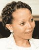 Bridgette, la soeur de Patrice, a cr sa propre socit minire et a fait la couverture du magazine sud-africain en juin 2002