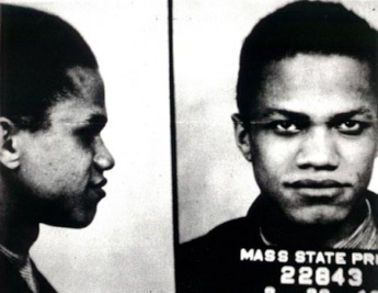 Malcolm X photographi lors de son arrestation. Il allait passer plusieurs annes en prison