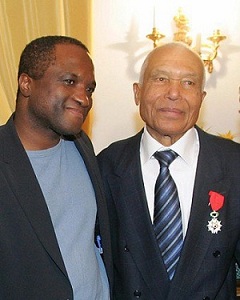 Serge Bilé et John William en 2005